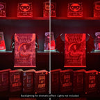 Side-by-side comparison of posable Curio Clip-On Gothic Demon Bat Wings in closed and open positions attached to a Curio Candy Floating Book Display Hanger under dramatic red lighting.